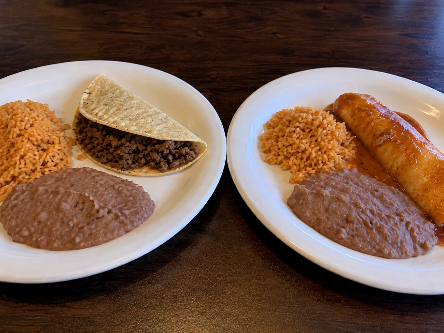 Taco or Enchilada plate served with rice and beans.